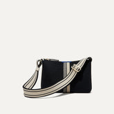 PLP |The Casual Crossbody in Black & Ivory Stripe, shown from the front.