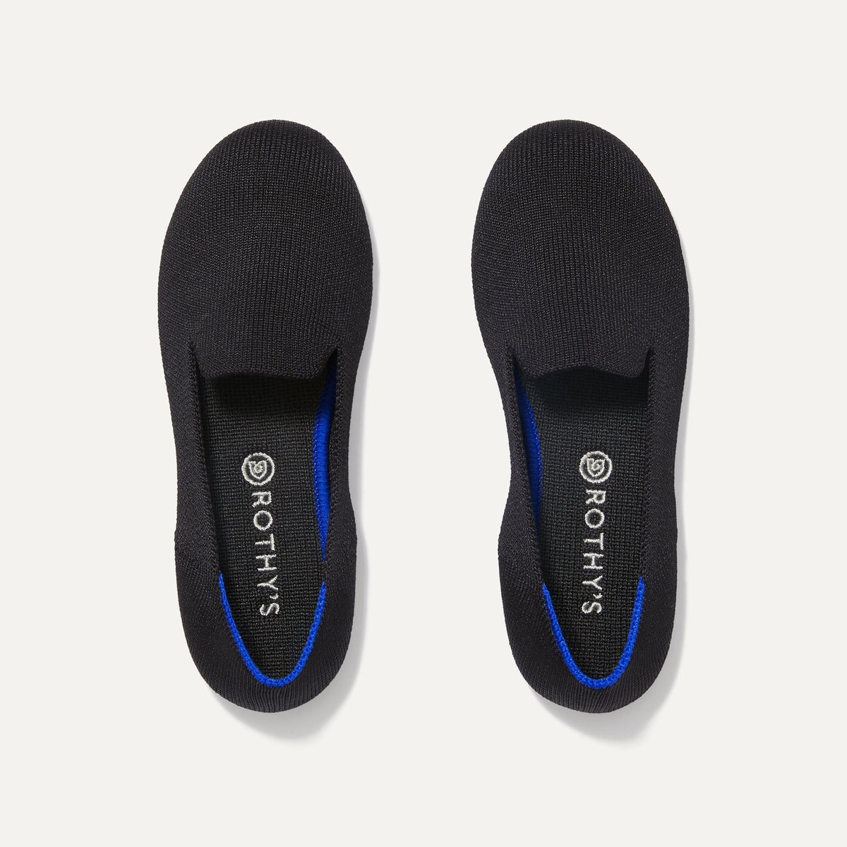 A pair of The Kids slip-on Loafers in Black Solid shown from the top view.