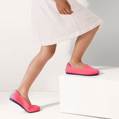 hover | The Kids slip-on Loafer in Flamingo shown on-model at an angle.