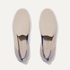 A pair of The slip-on Sneaker in Sand shown from the top view.