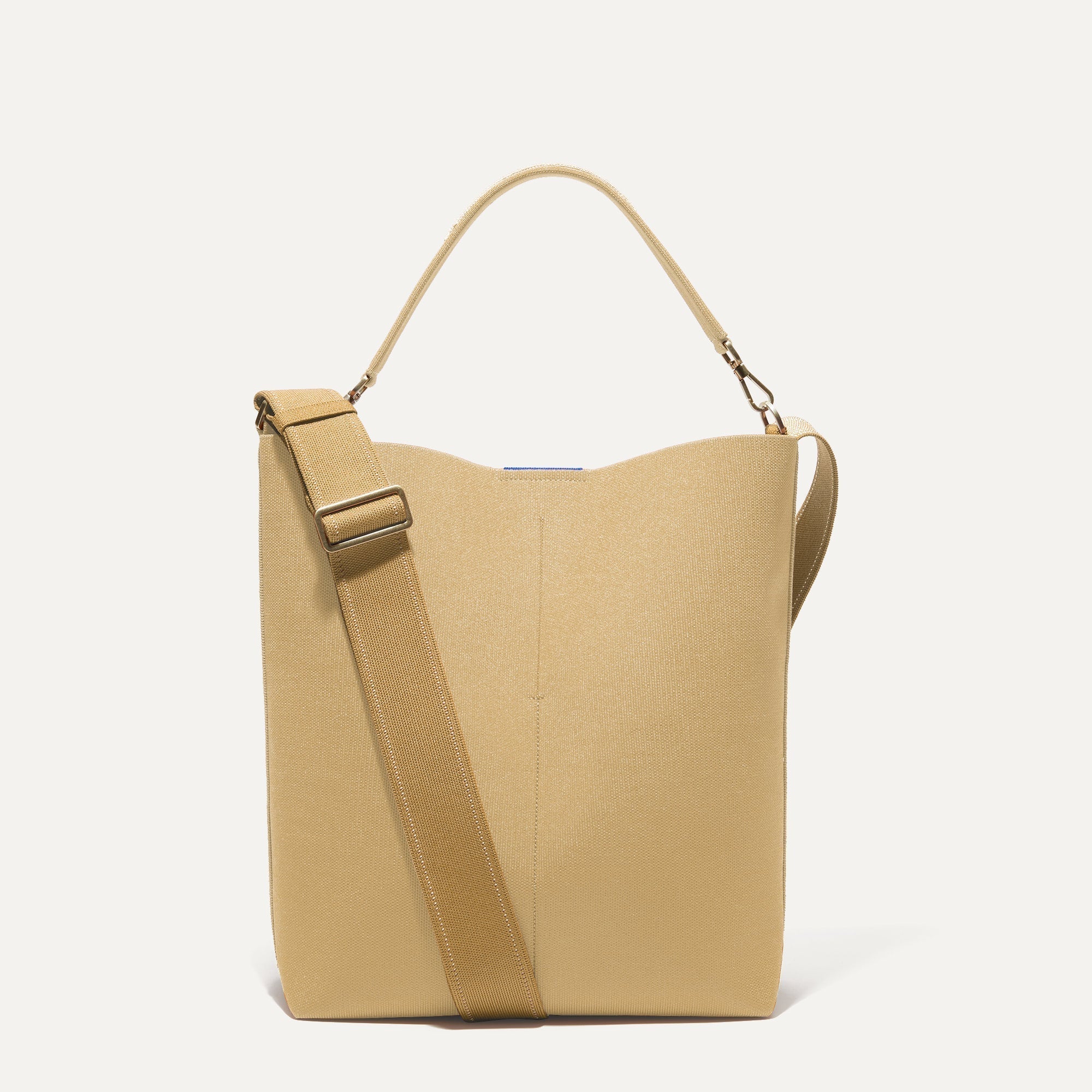 PLP |The Bucket Bag in Golden Wheat shown from the front.