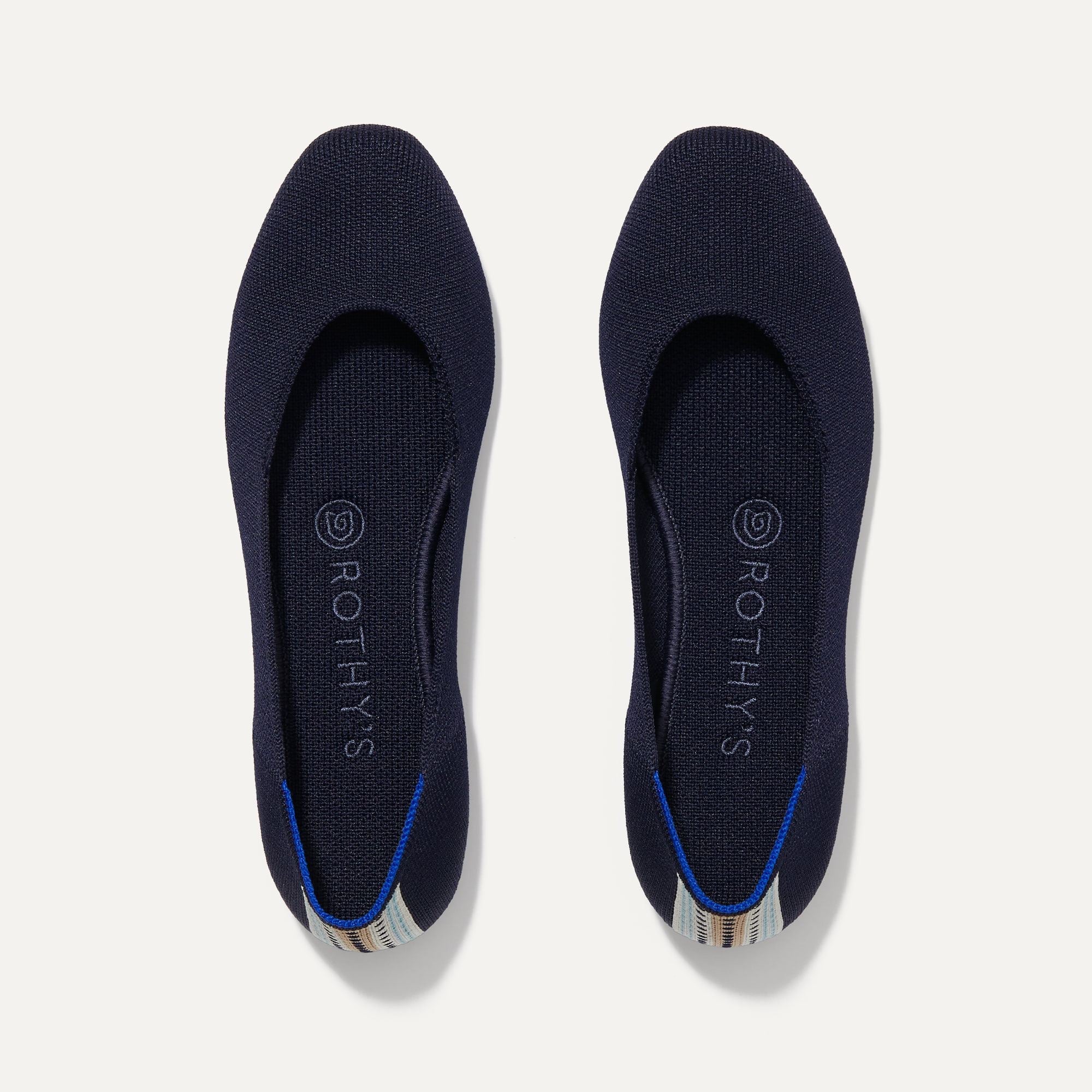 A pair of The Square toe flat shoe in Navy shown from the top view.