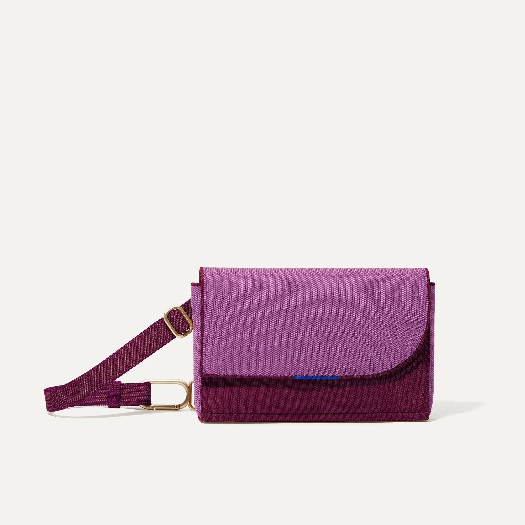 PLP |The Belt Bag in Plum Berry shown from the front.