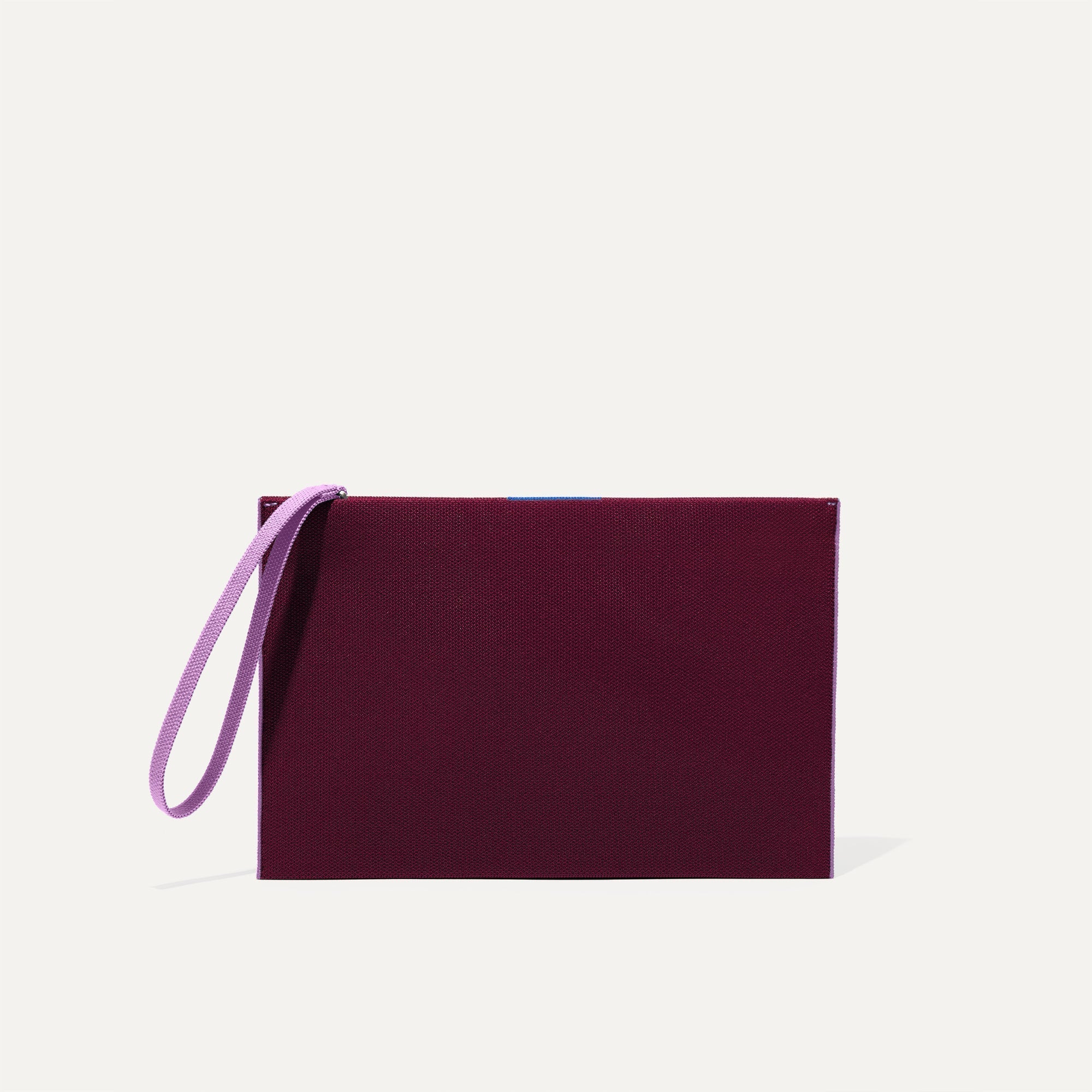 PLP |The Wristlet in Collegiate Currant shown from the front.