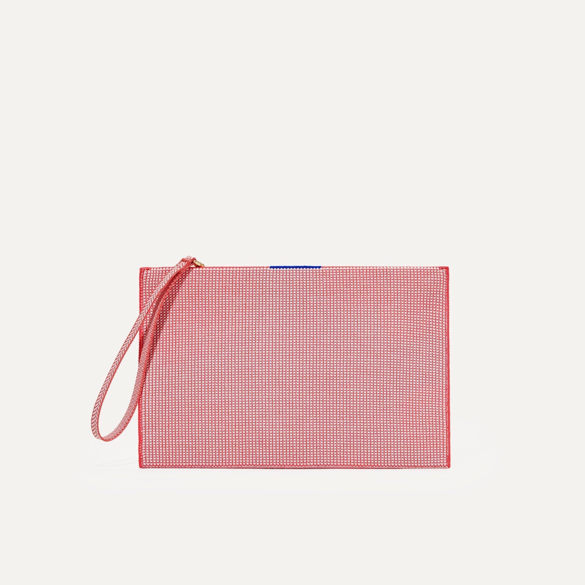 PLP |The Wristlet in Coral Grid shown from the front.