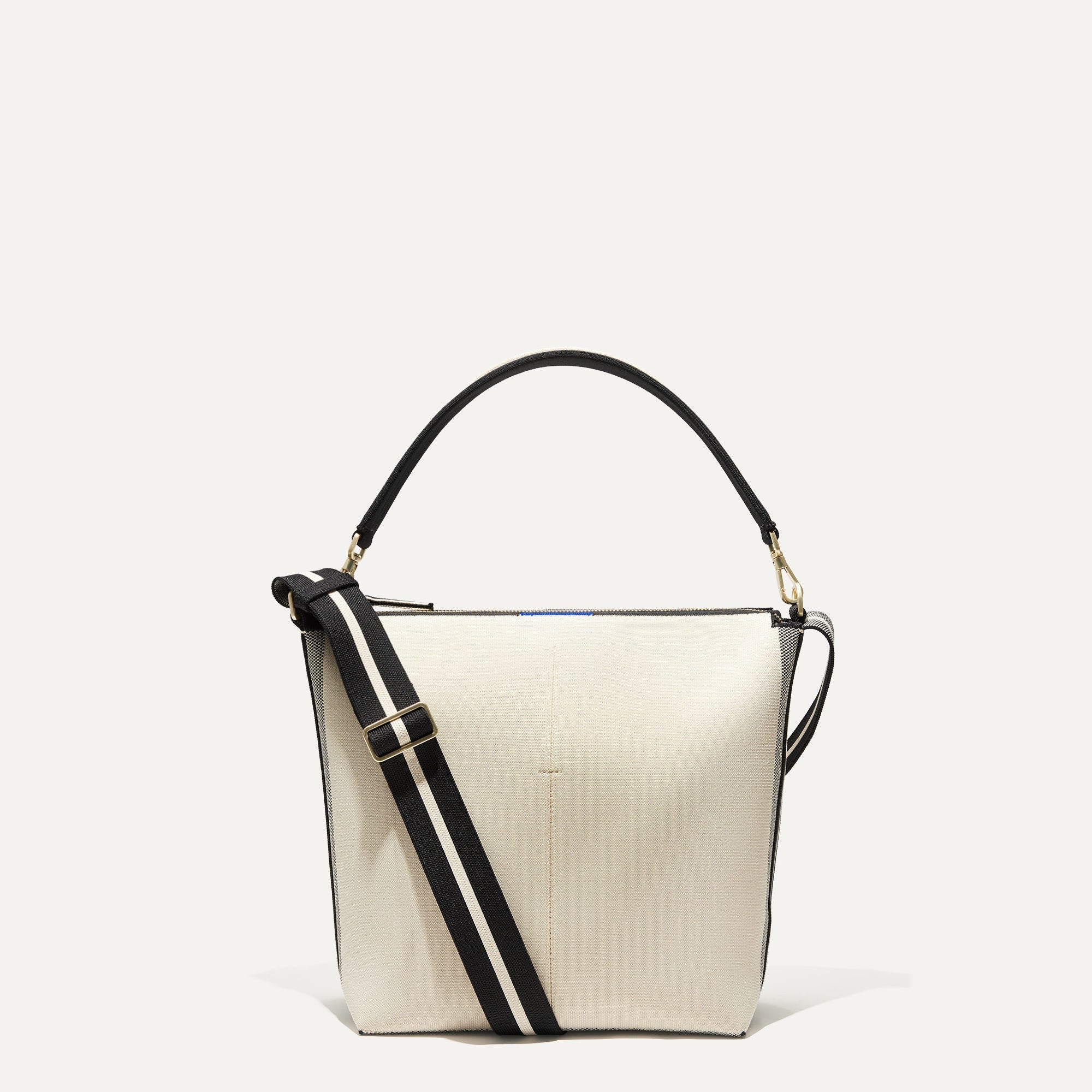 PLP |The Mini Zip Bucket in Ivory & Black shown from the front.