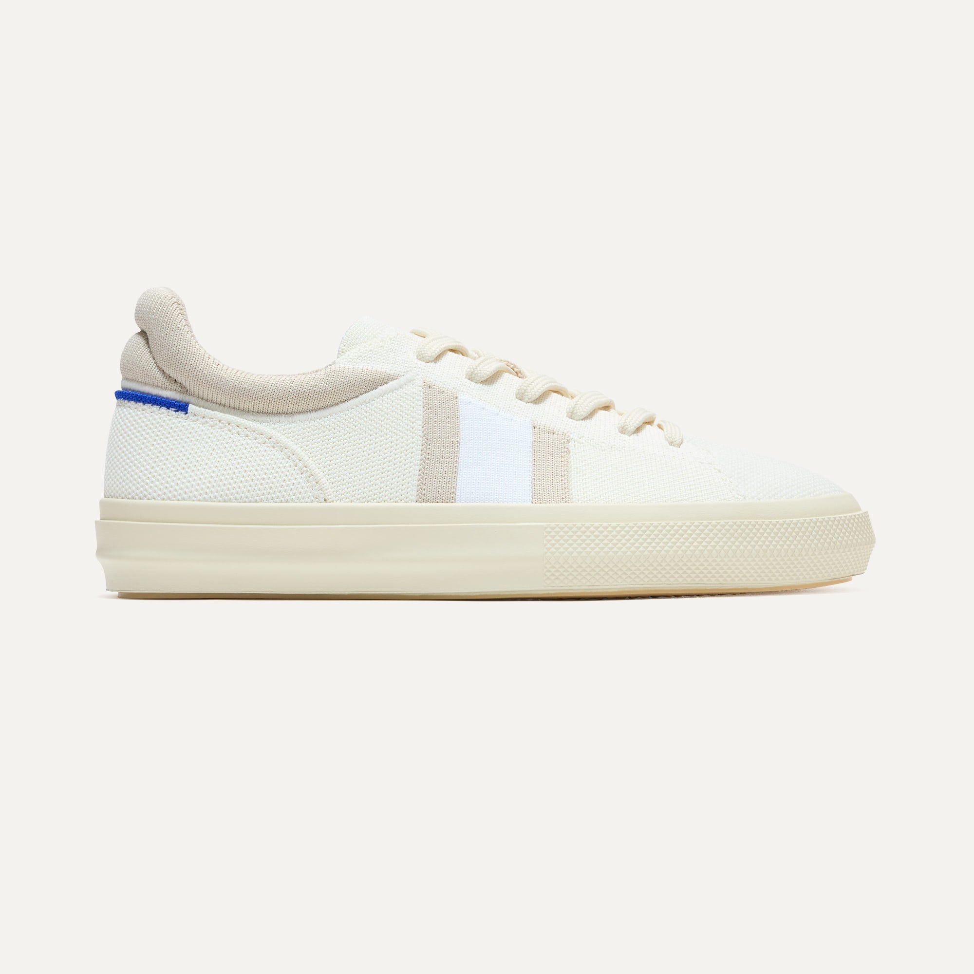 The RS02 Sneaker in Buff shown from the side.