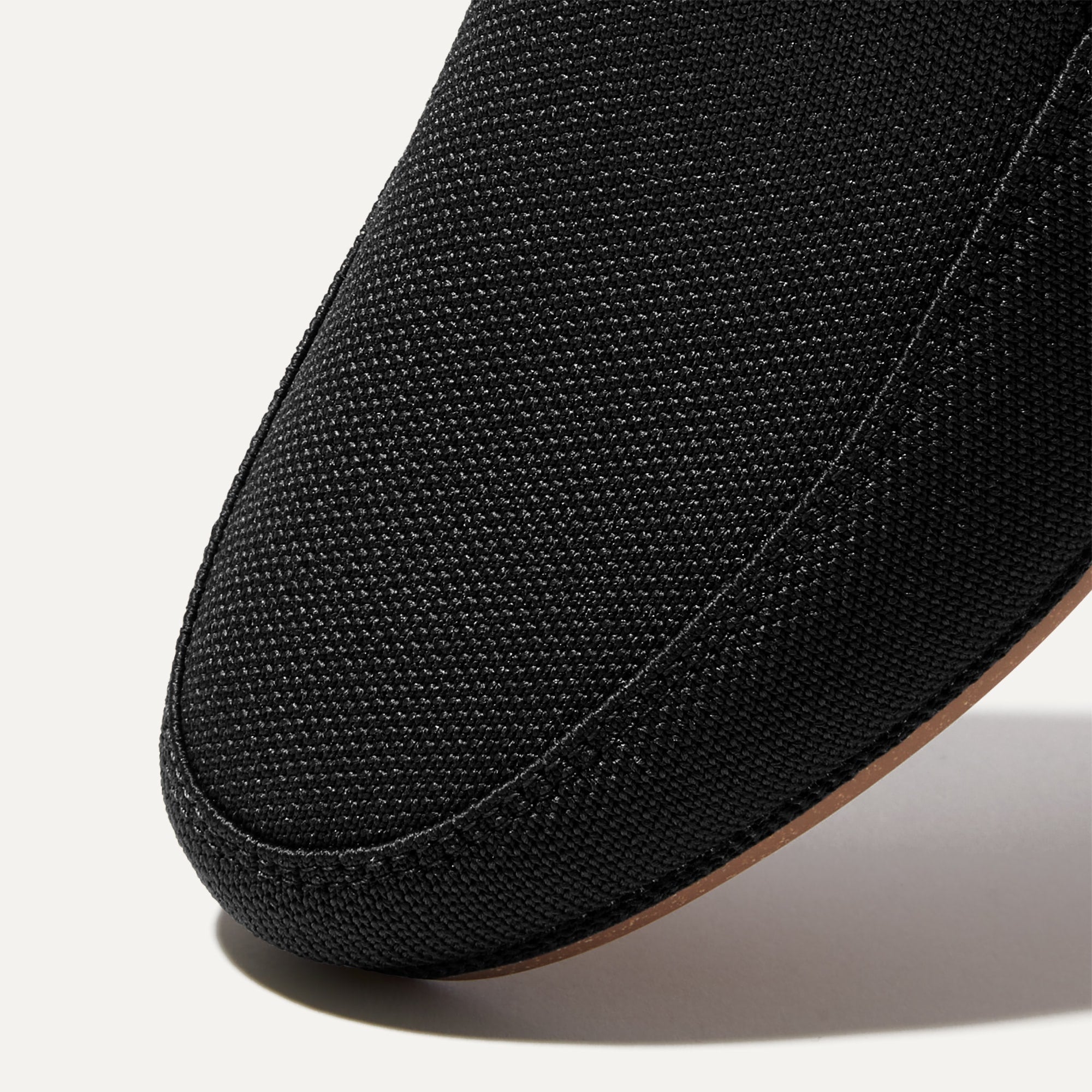 Close up of the toe and vamp of The Ravello Loafer in Stone Black.