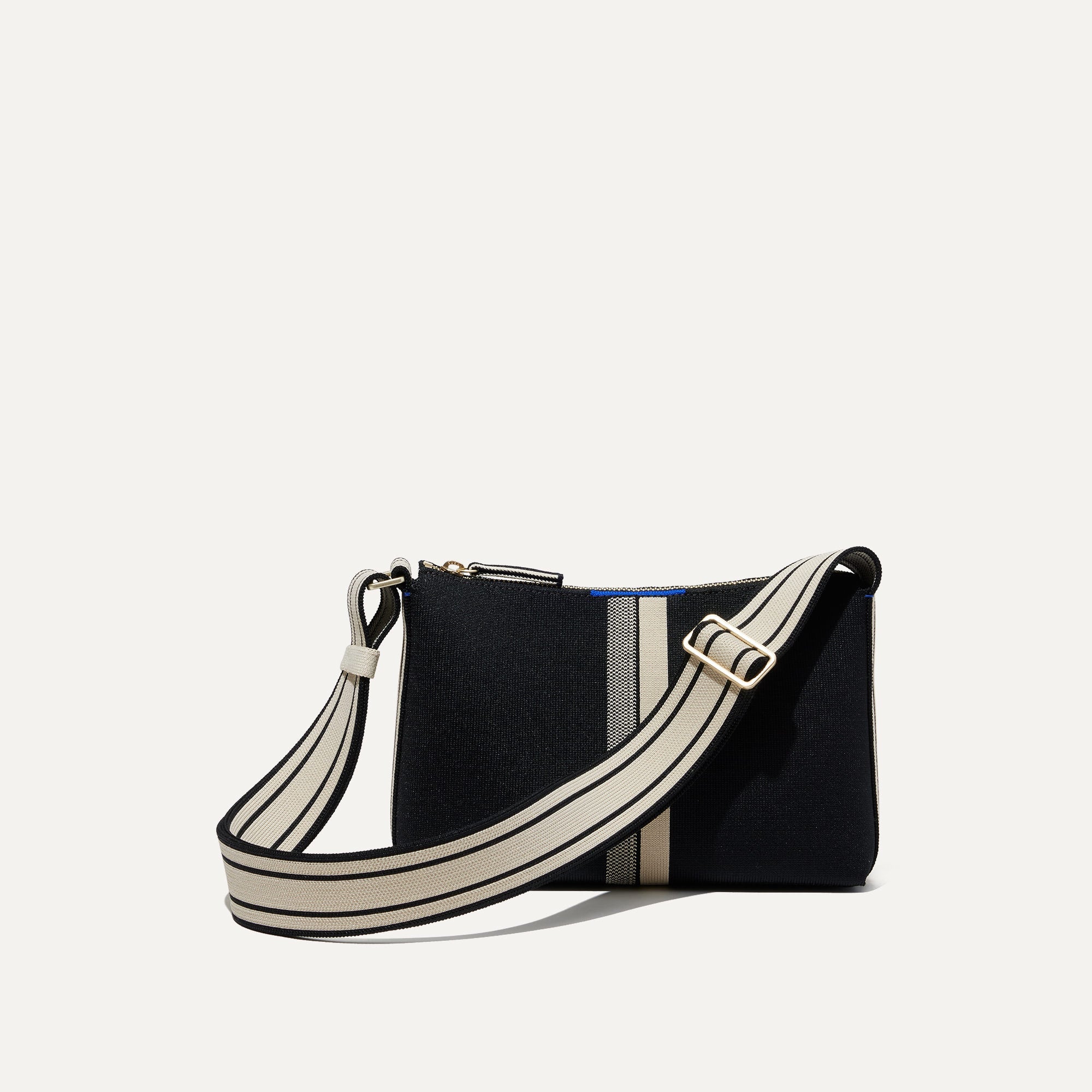 PLP |The Casual Crossbody in Black & Ivory Stripe, shown from the front.