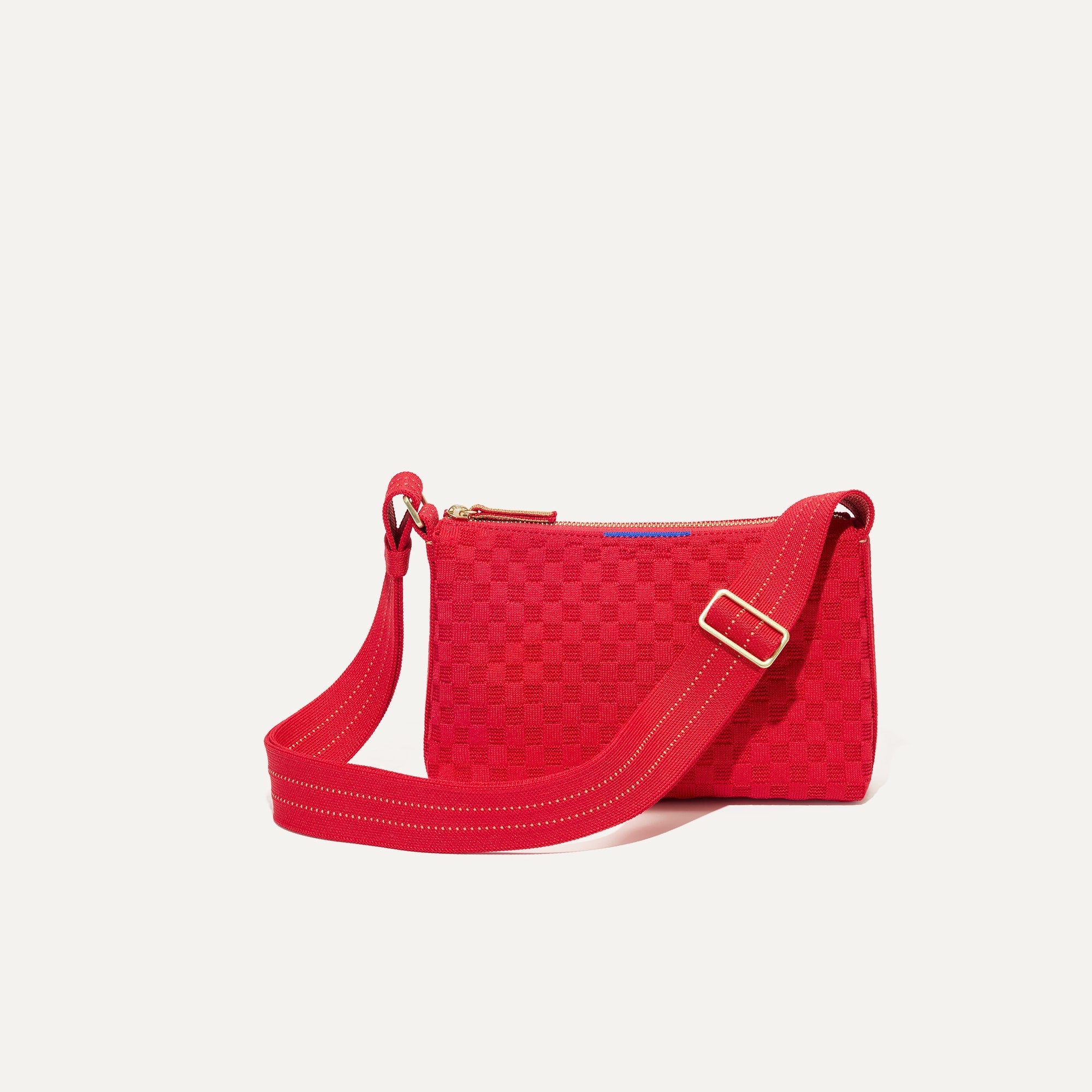 PLP |The Casual Crossbody in Red Crisp Basketweave shown from the front.