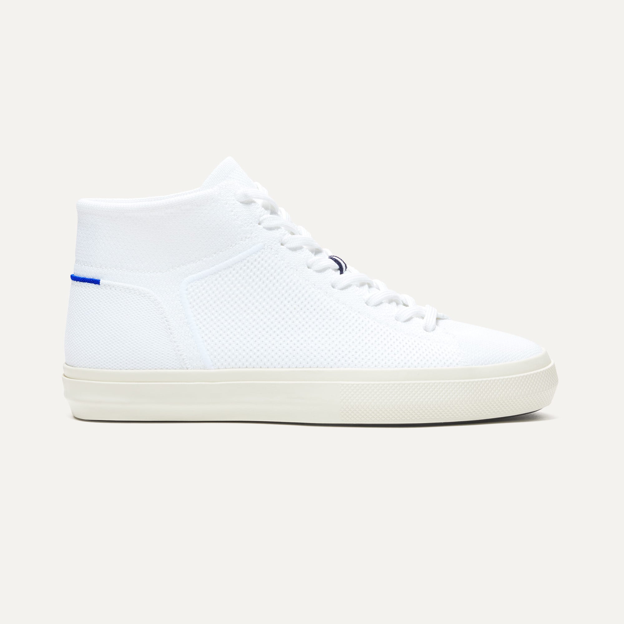 The High Top Sneaker in Bright White shown from the side. 