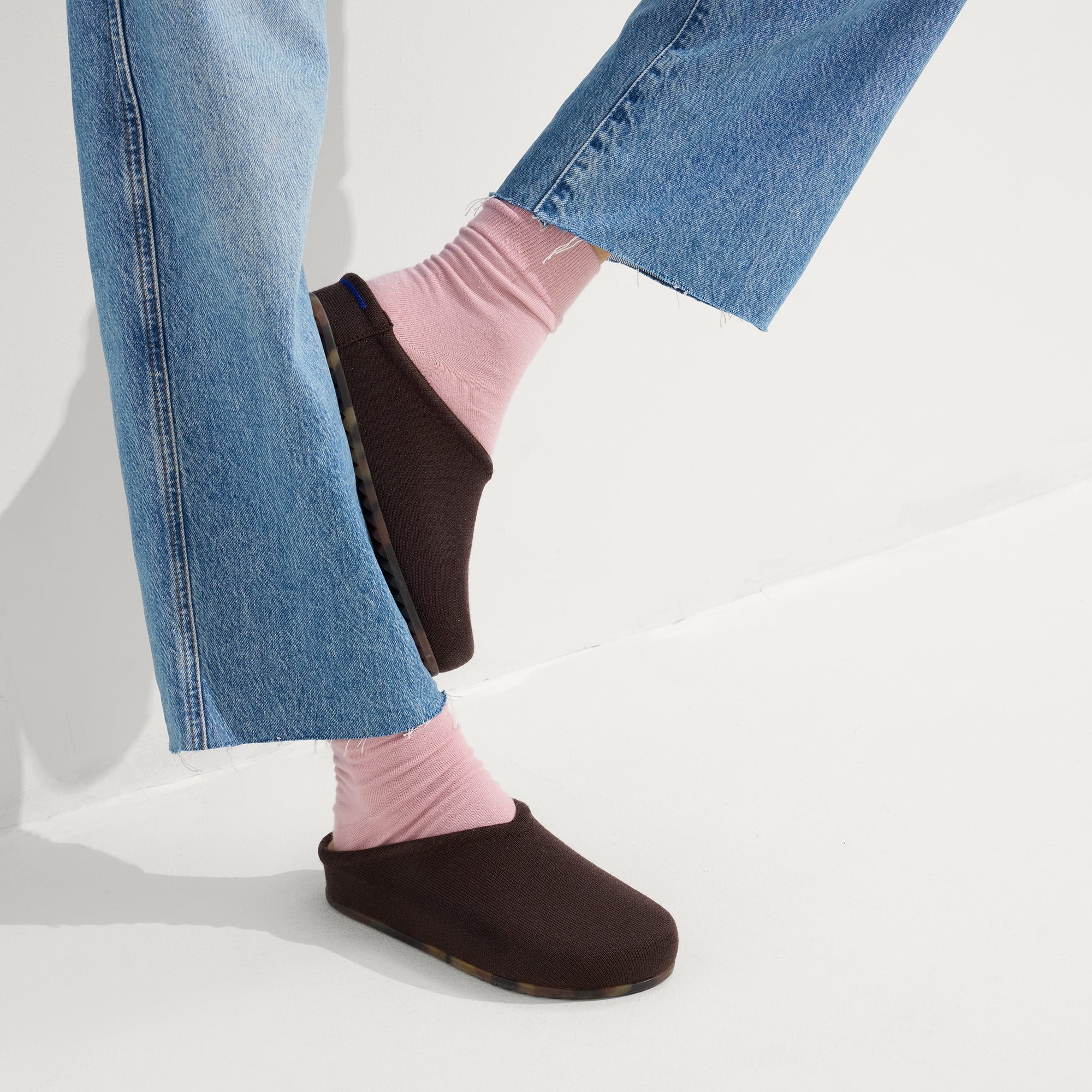 hover | Model wearing The Casual Clog in Chestnut.