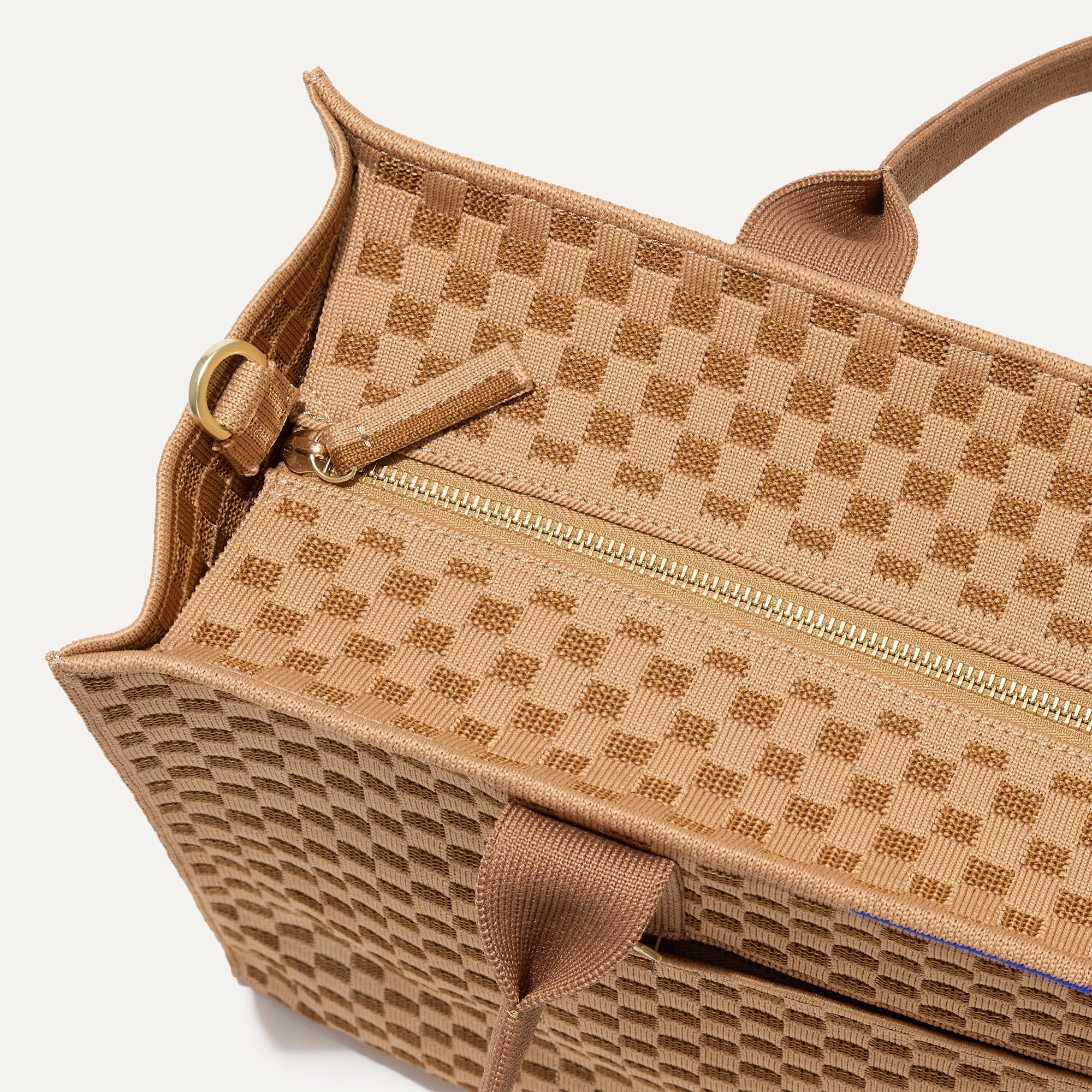 The Classic Tote in Hazelnut, shown from above, with the top zipper closed. 
