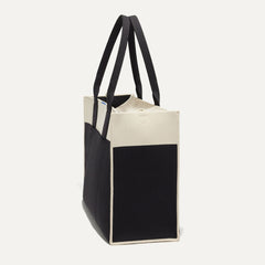 The Classic Tote in Luna, shown from the side.