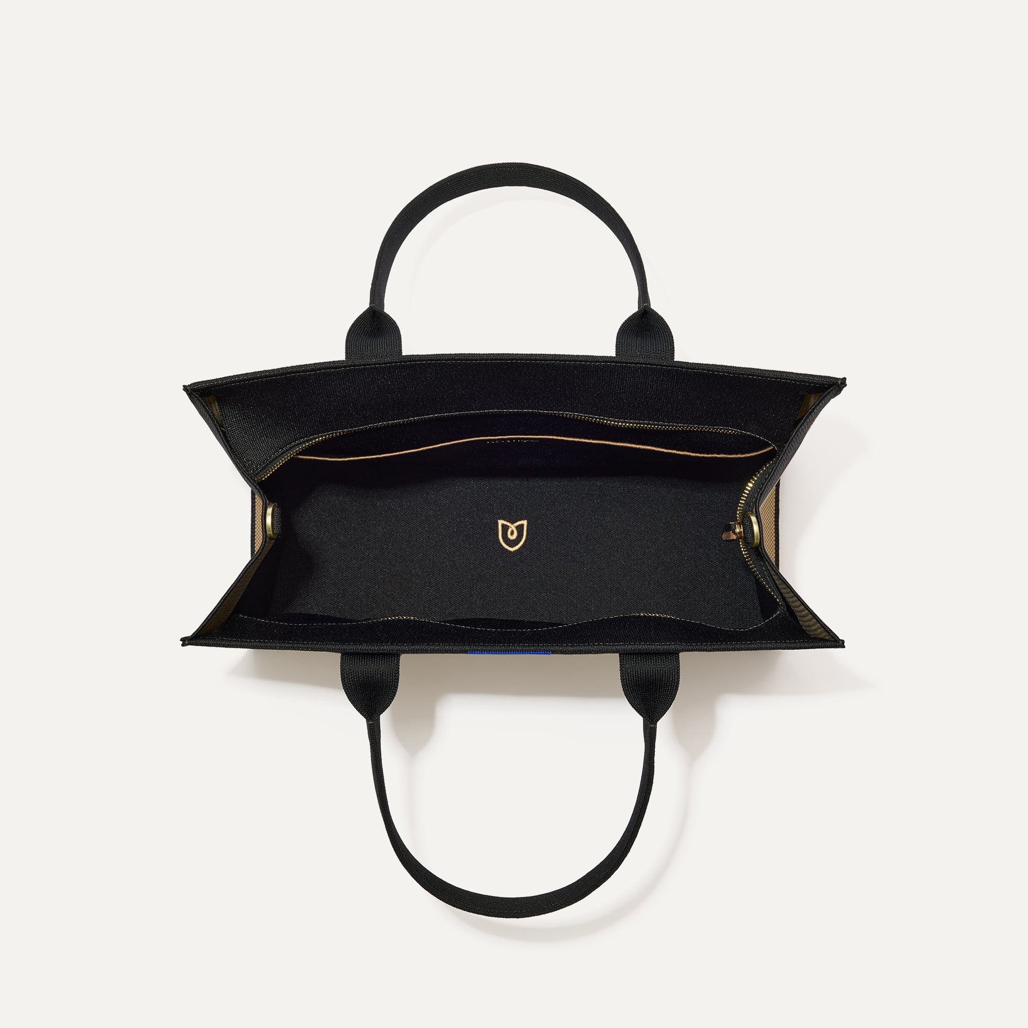 The Classic Tote in Tiramisu, shown from above, with the interior exposed.