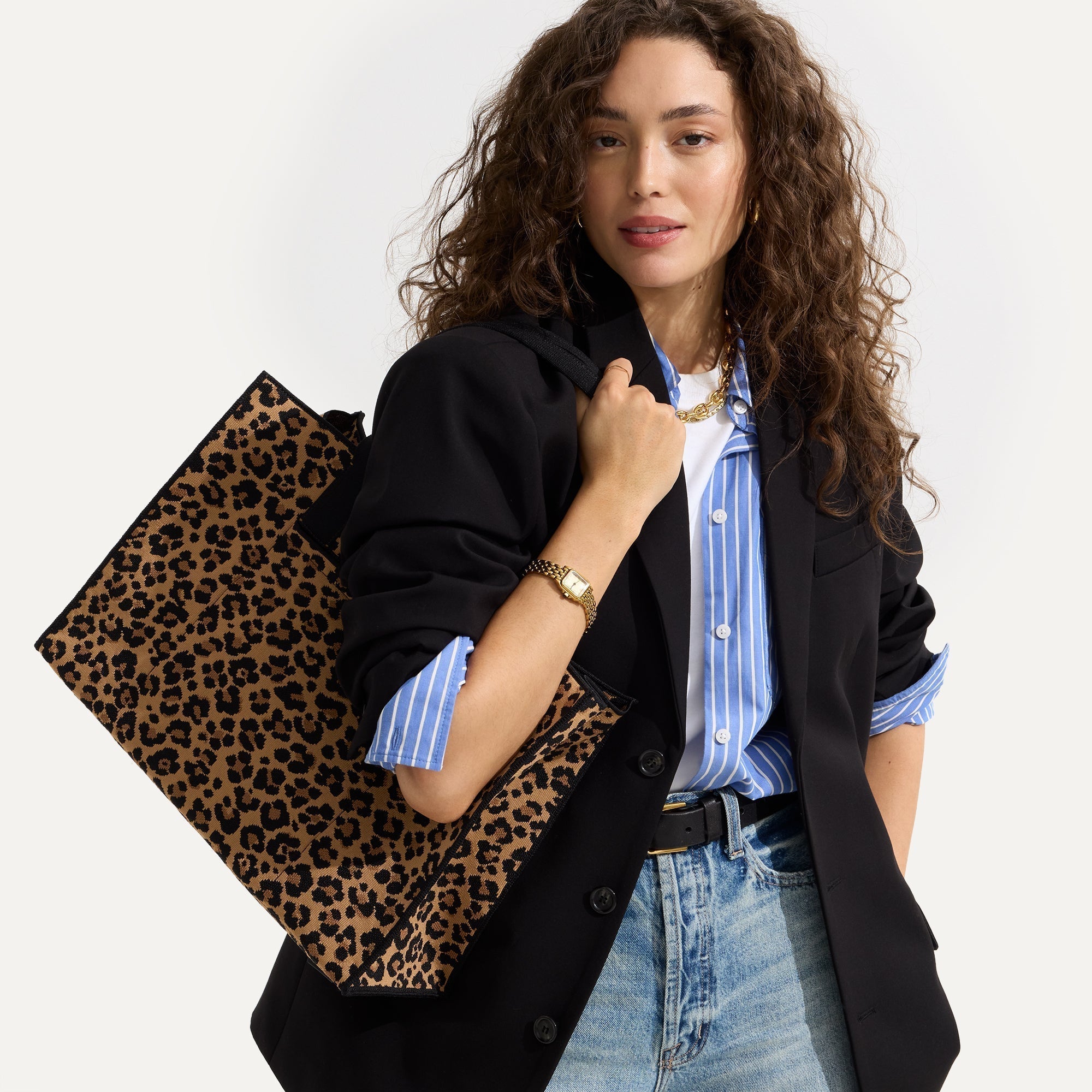 hover | The Classic Tote in Toasty Cat, worn over the shoulder by a model, shown from the side.