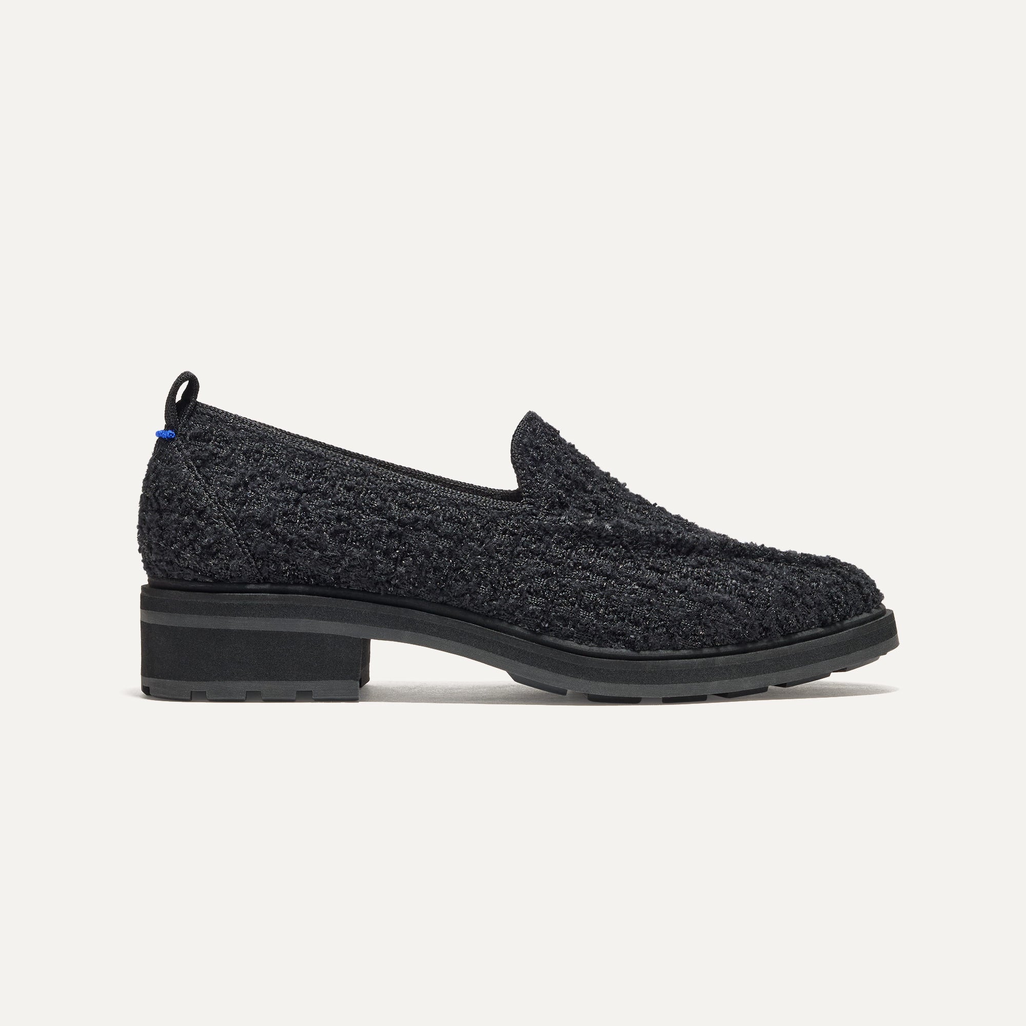 The Lug Loafer in Black Bouclé shown from the side. 