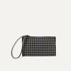 PLP |The Wallet Wristlet in Black and Ivory Grid, shown from the front.