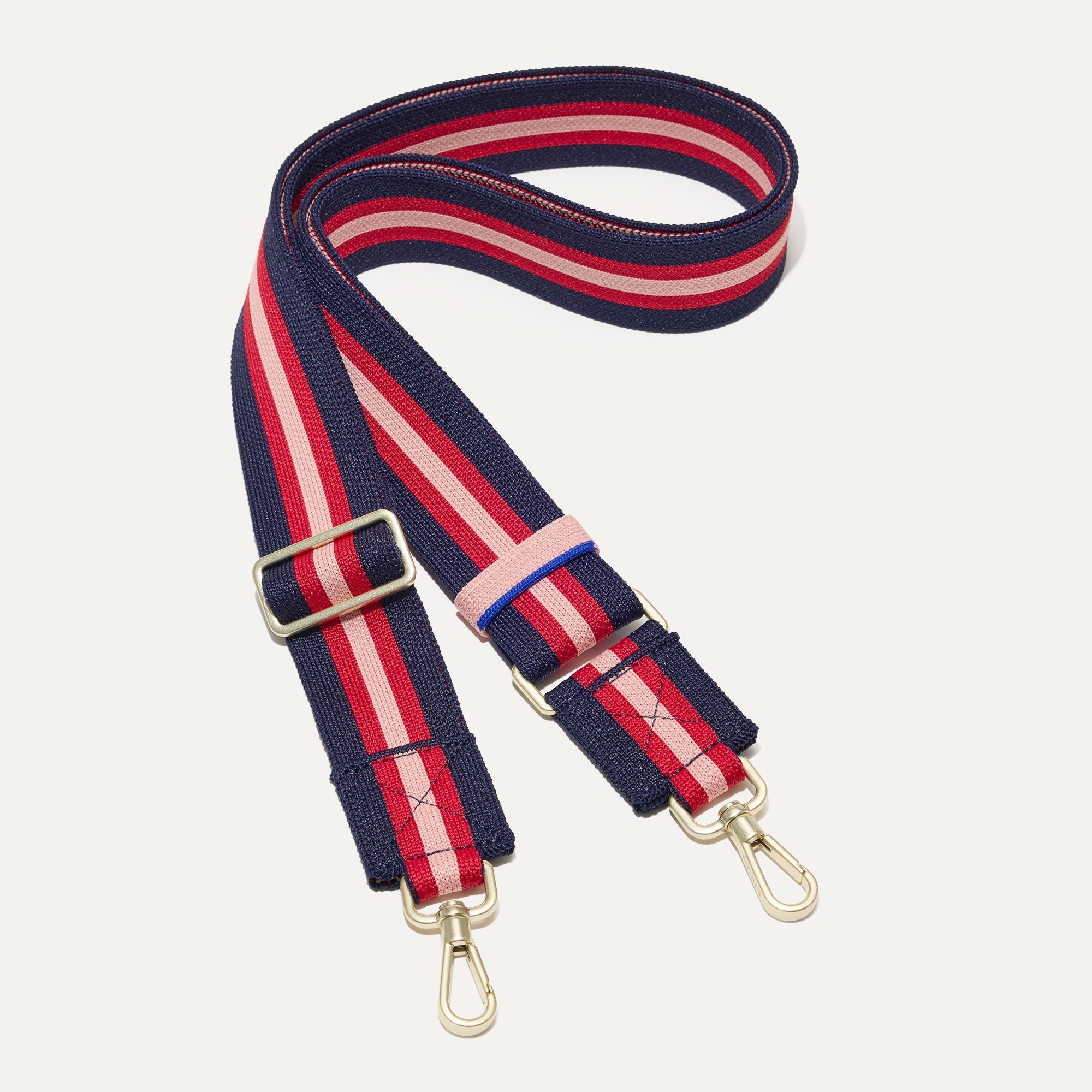 The Crossbody Strap in Confetti Stripe.