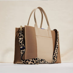 The Crossbody Strap in Desert Cat, shown paired with The Classic Tote.