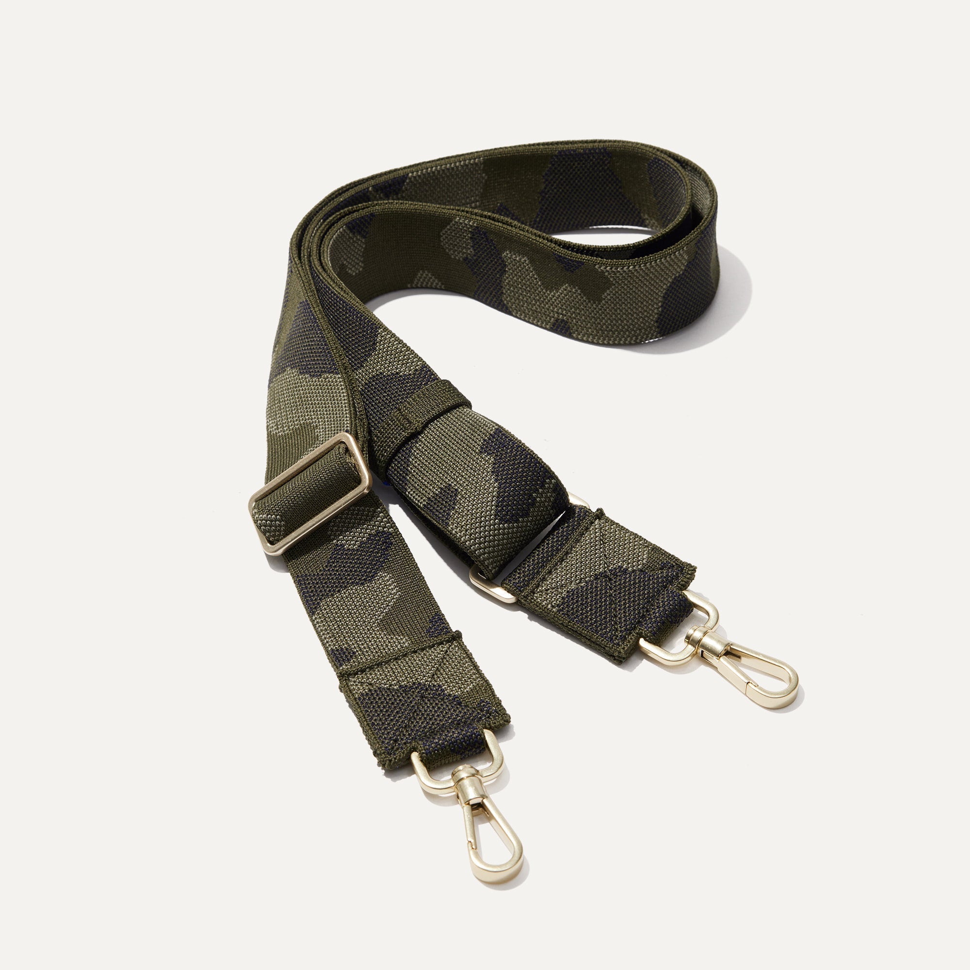 The Crossbody Strap in Spruce Camo.