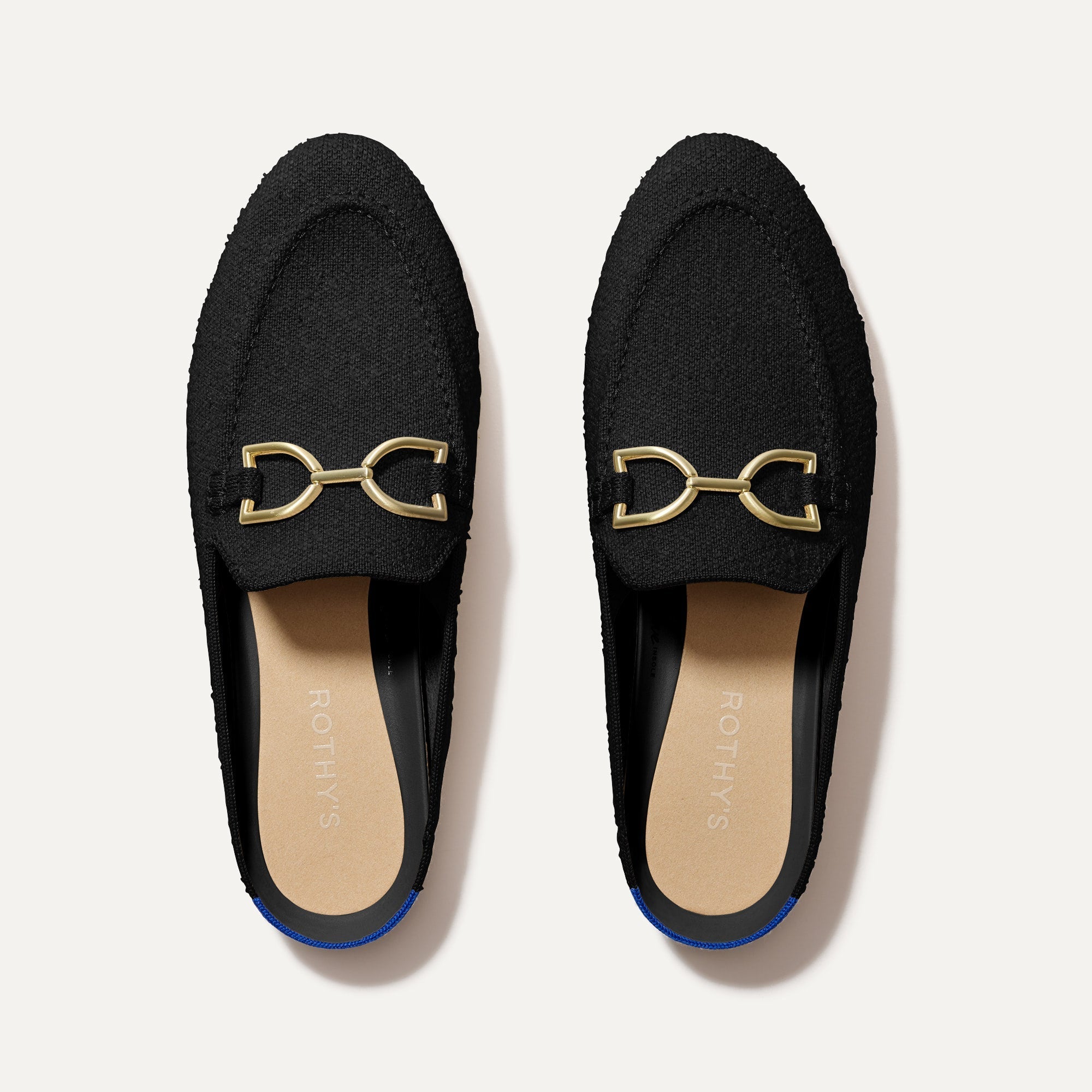 The Double Bit Loafer Mule in Black Bouclé shown from the top. 