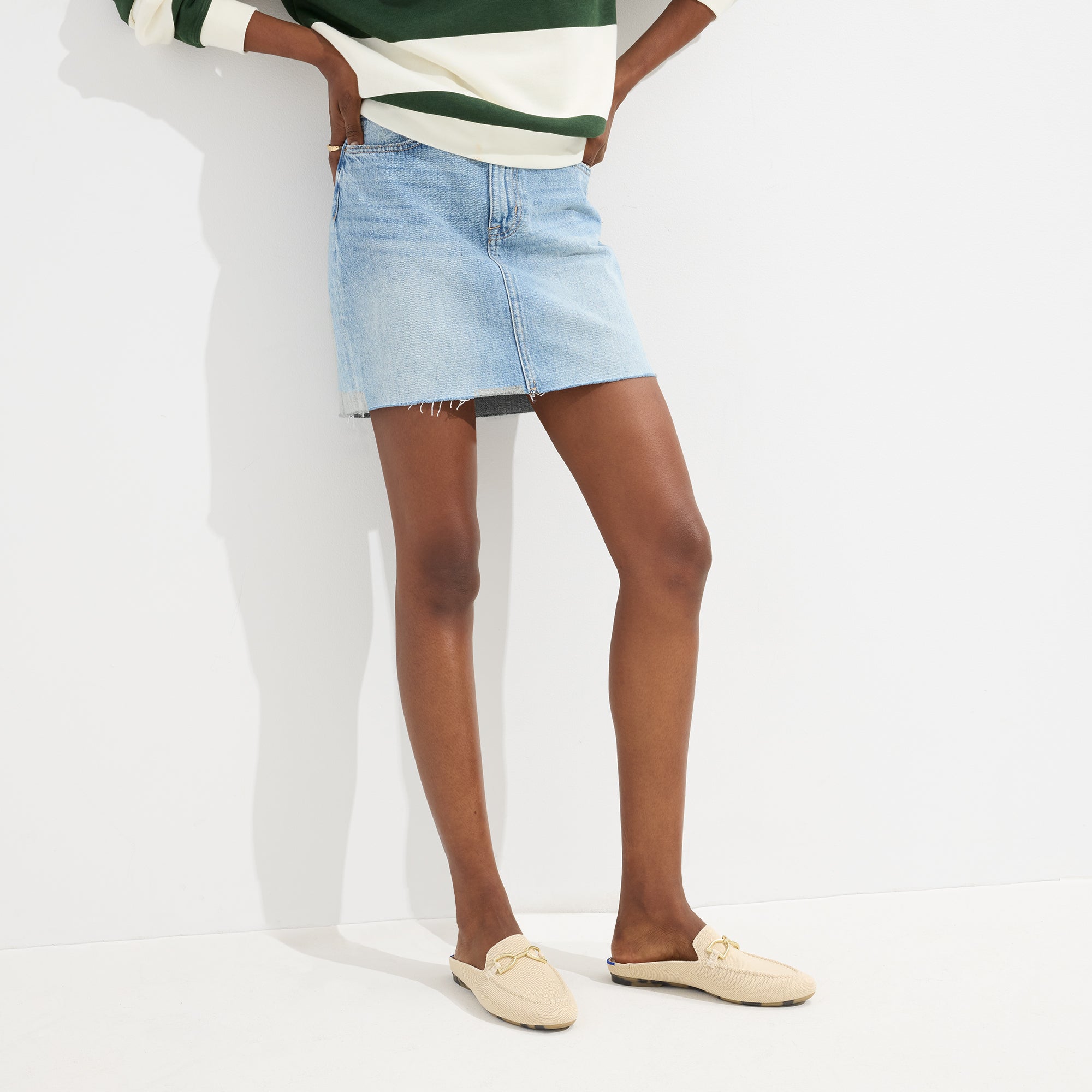 hover | Model wearing The Double Bit Loafer Mule in Sandstone. 