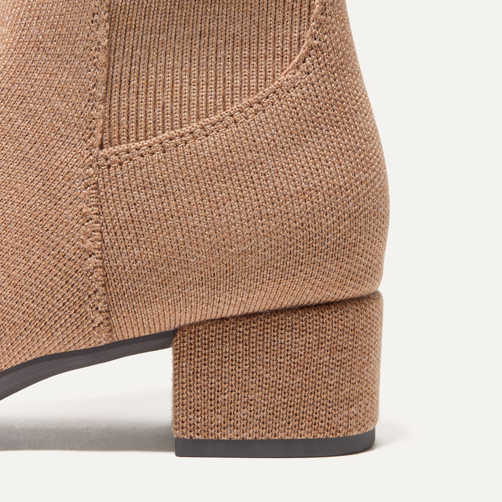 Close up of the block heel of The Classic Boot in Tobacco.