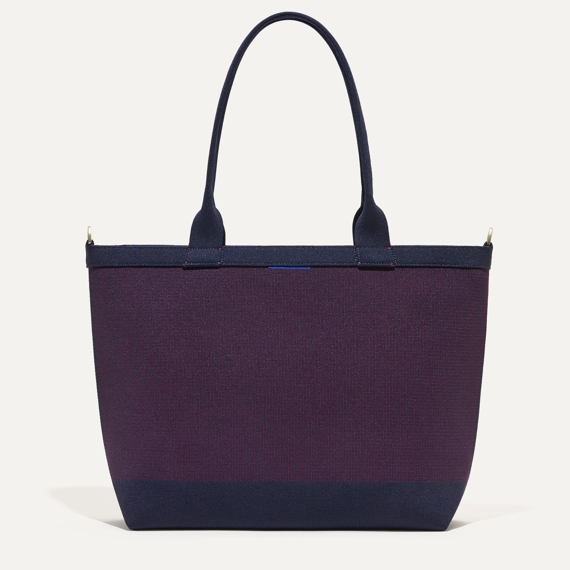 PLP |The Lightweight Zip Tote in Dark Aubergine shown from the front.