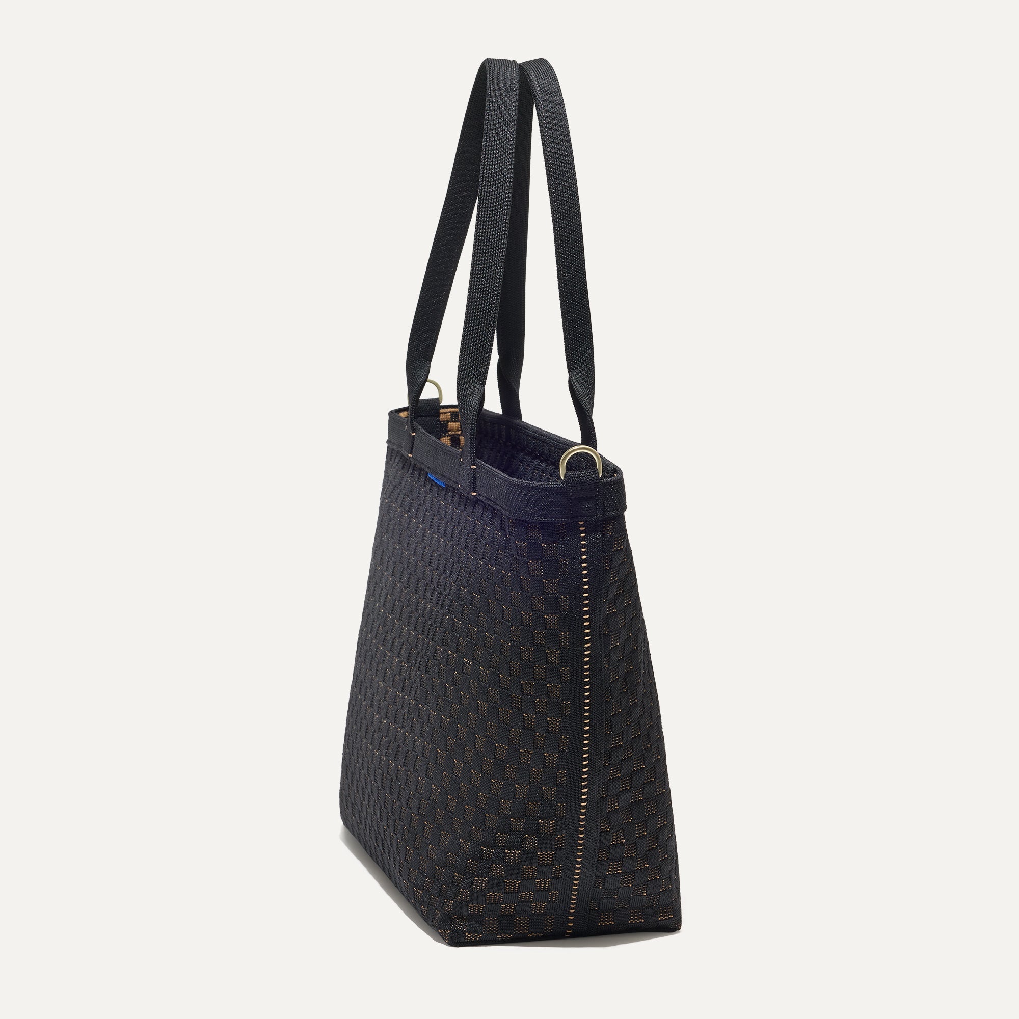 The Lightweight Zip Tote in Night Song shown from the side.