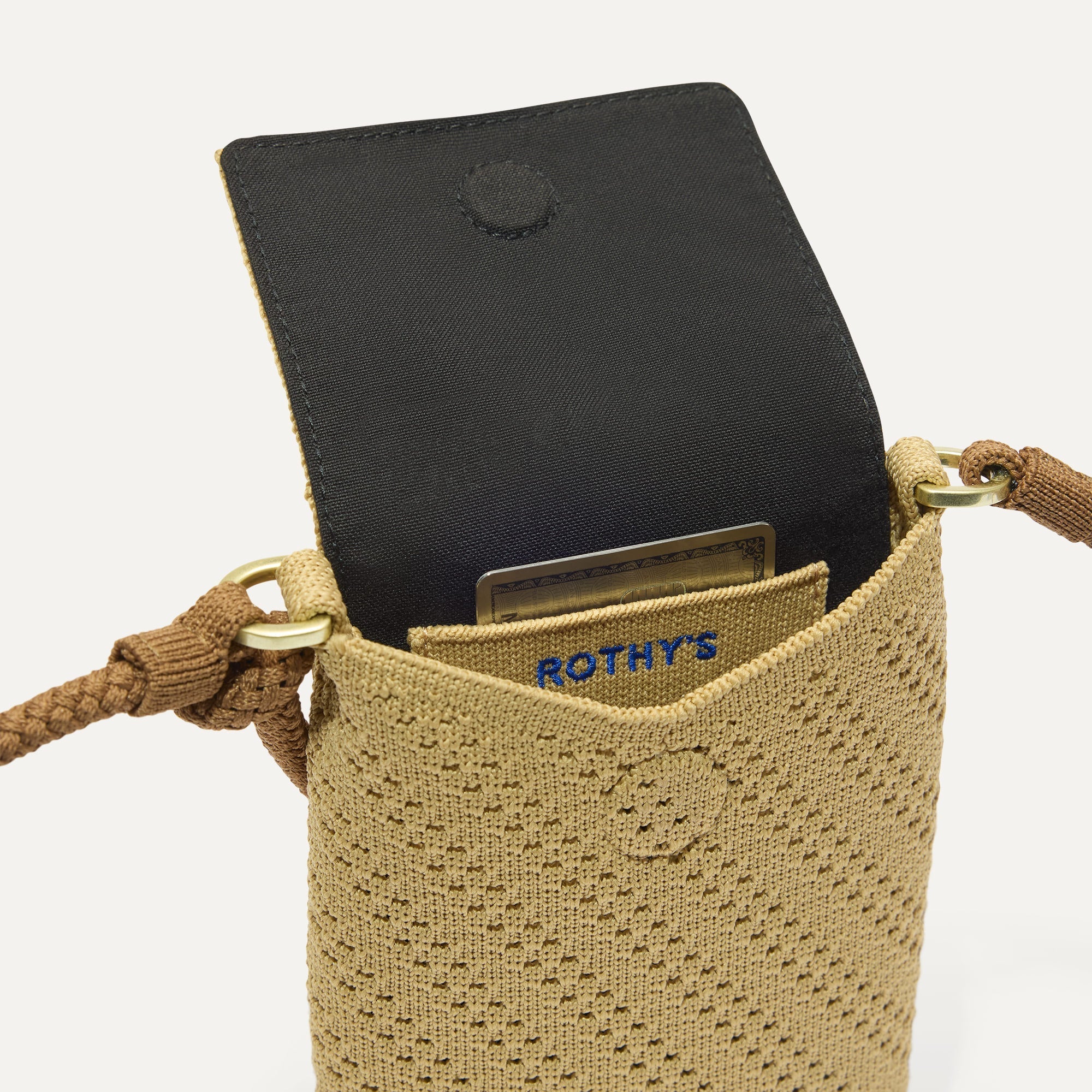 Close up of The Phone Crossbody interior slip pocket.