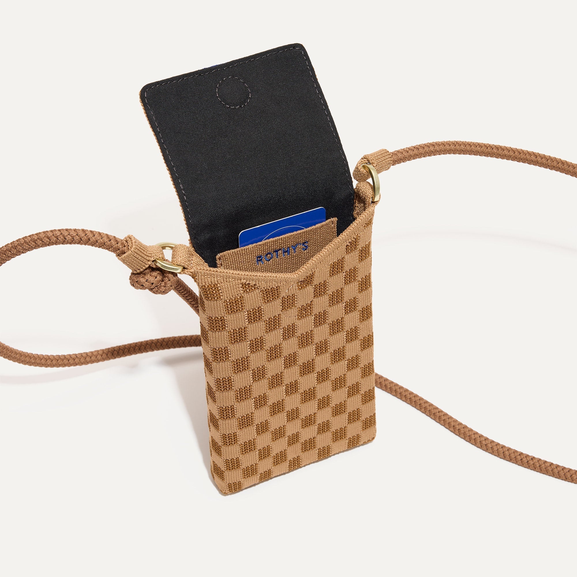 Close up of The Phone Crossbody interior slip pocket.