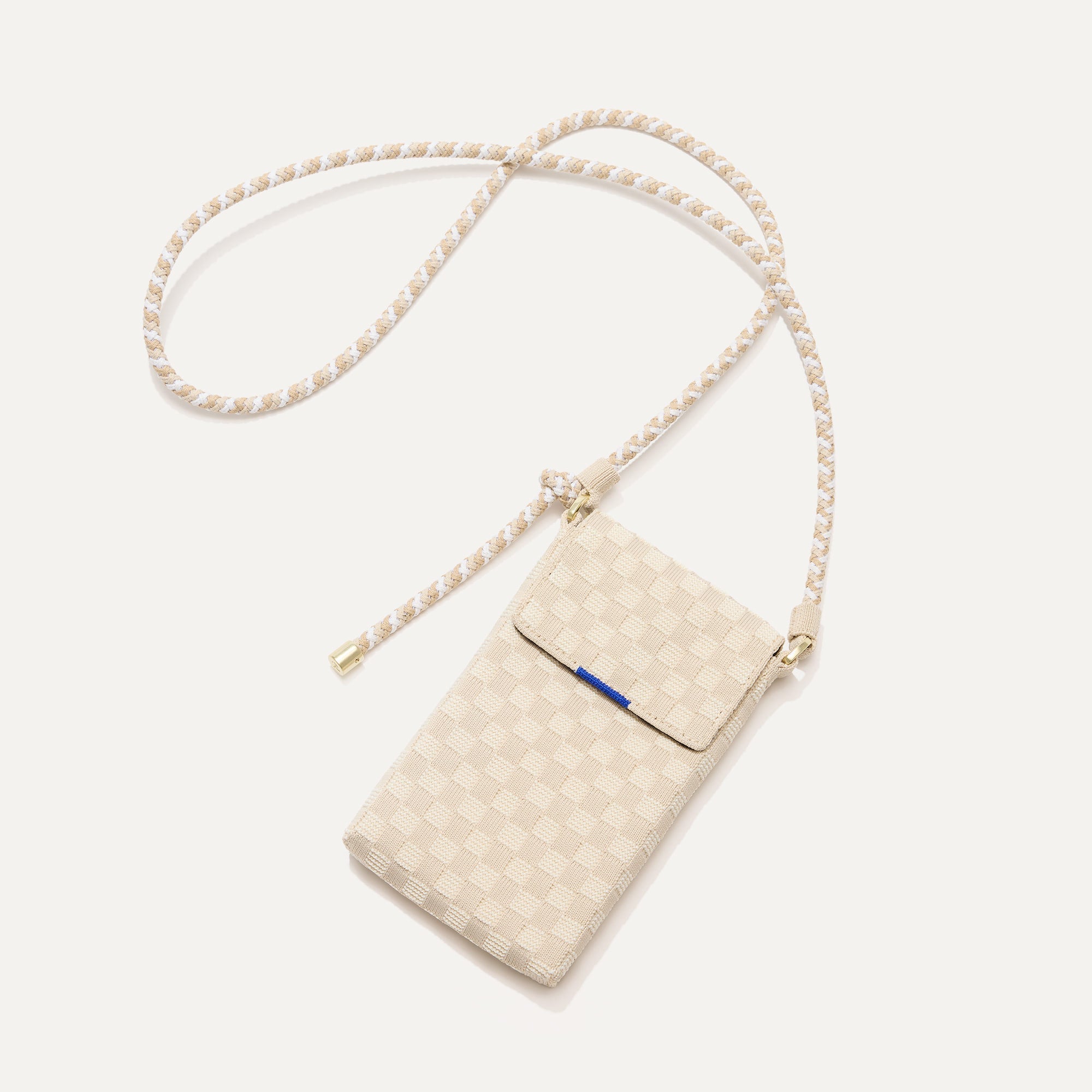 The Phone Crossbody in White Sand shown from above.
