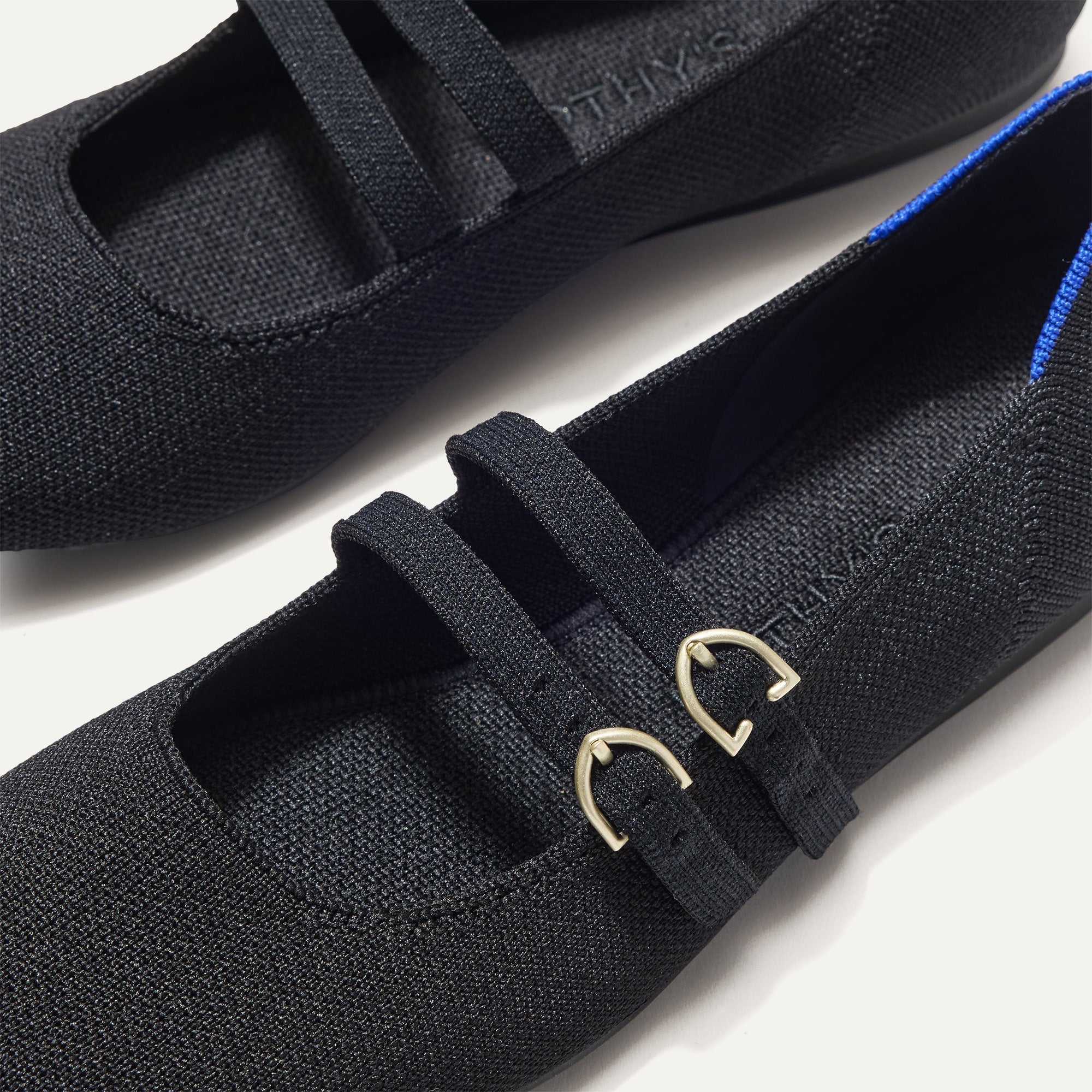 Close up of the buckle details of The Double Buckle Mary Jane in Black.