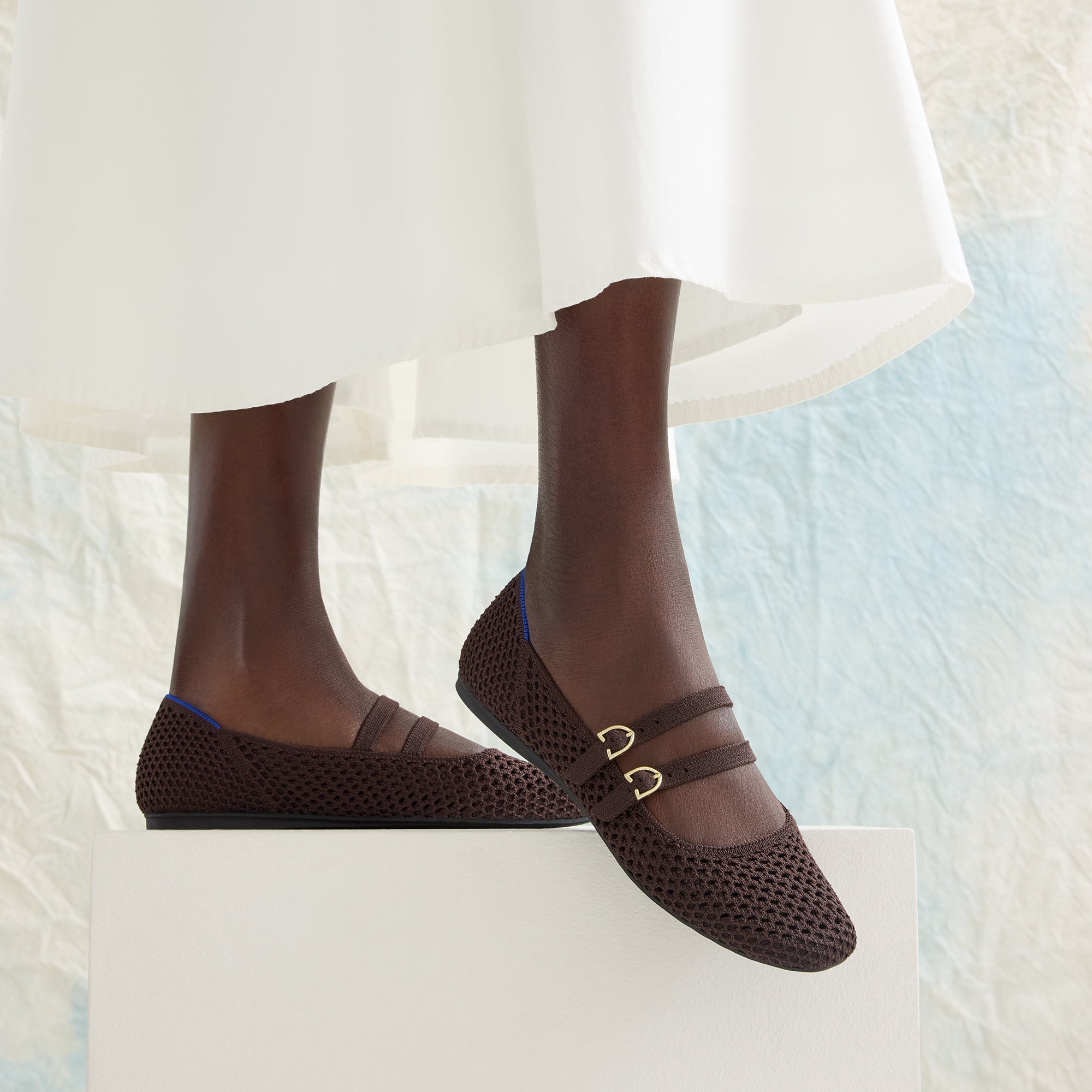 hover | Model wearing The Double Buckle Mary Jane in Chocolate Mesh.