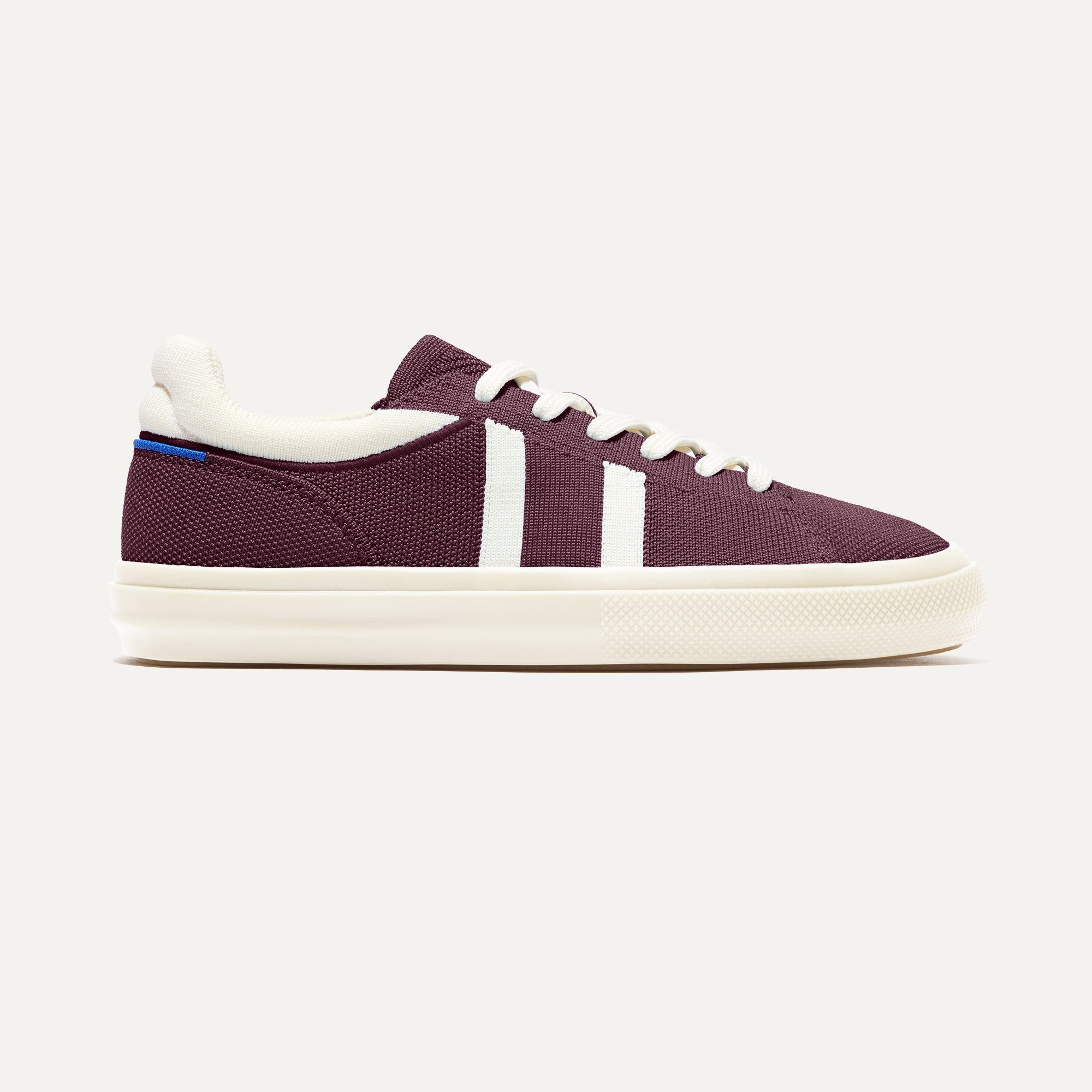 The RS02 Sneaker Burgundy Blitz shown from the side. 