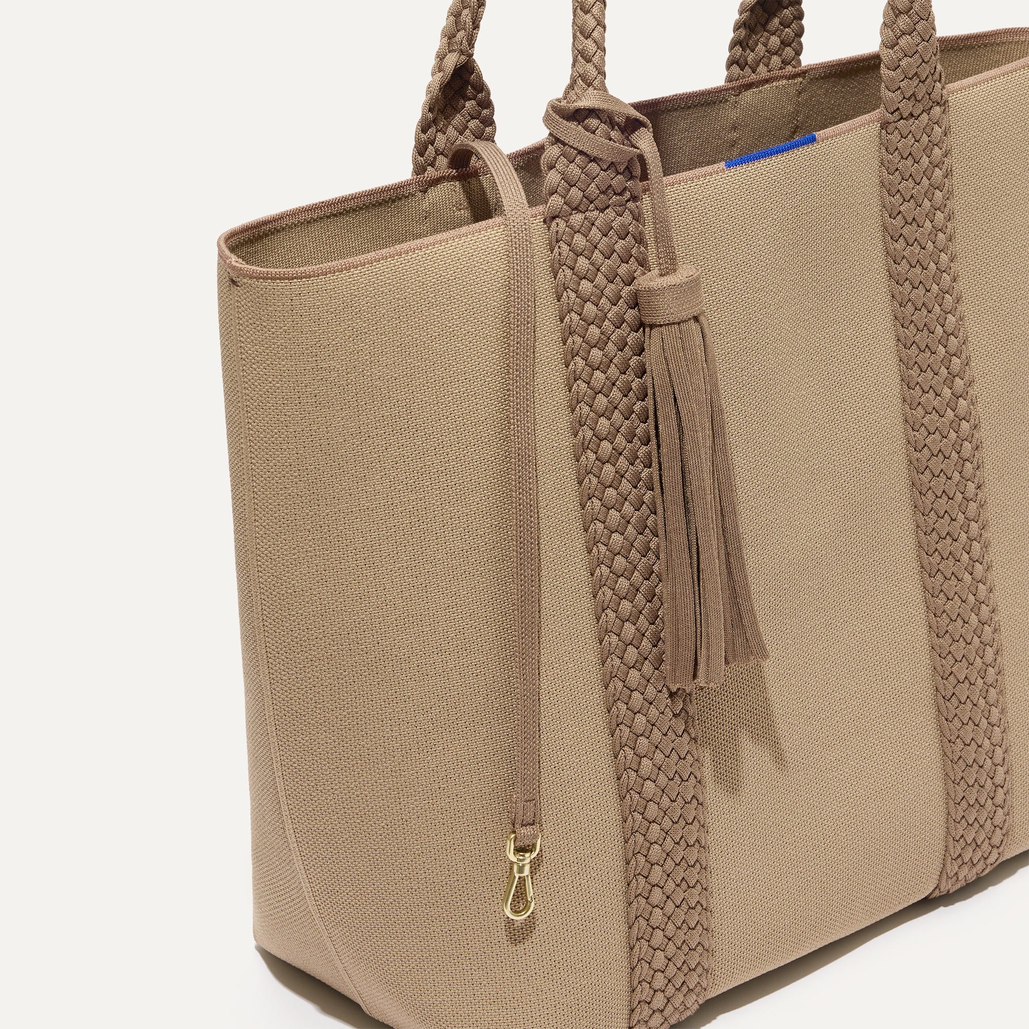 The Lightweight Tote in Caramel Twist shown with its handy key leash. 