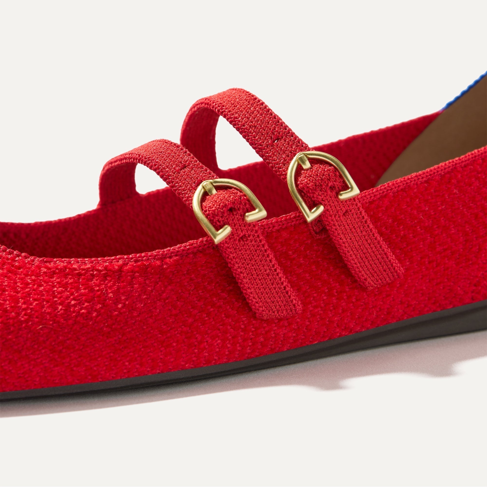 Close up of the buckle details of The Double Buckle Mary Jane in ReVelvet™ Red Crisp.