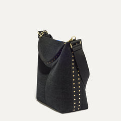 The Bucket Bag in ReVelvet™ Black shown in a diagonal view.