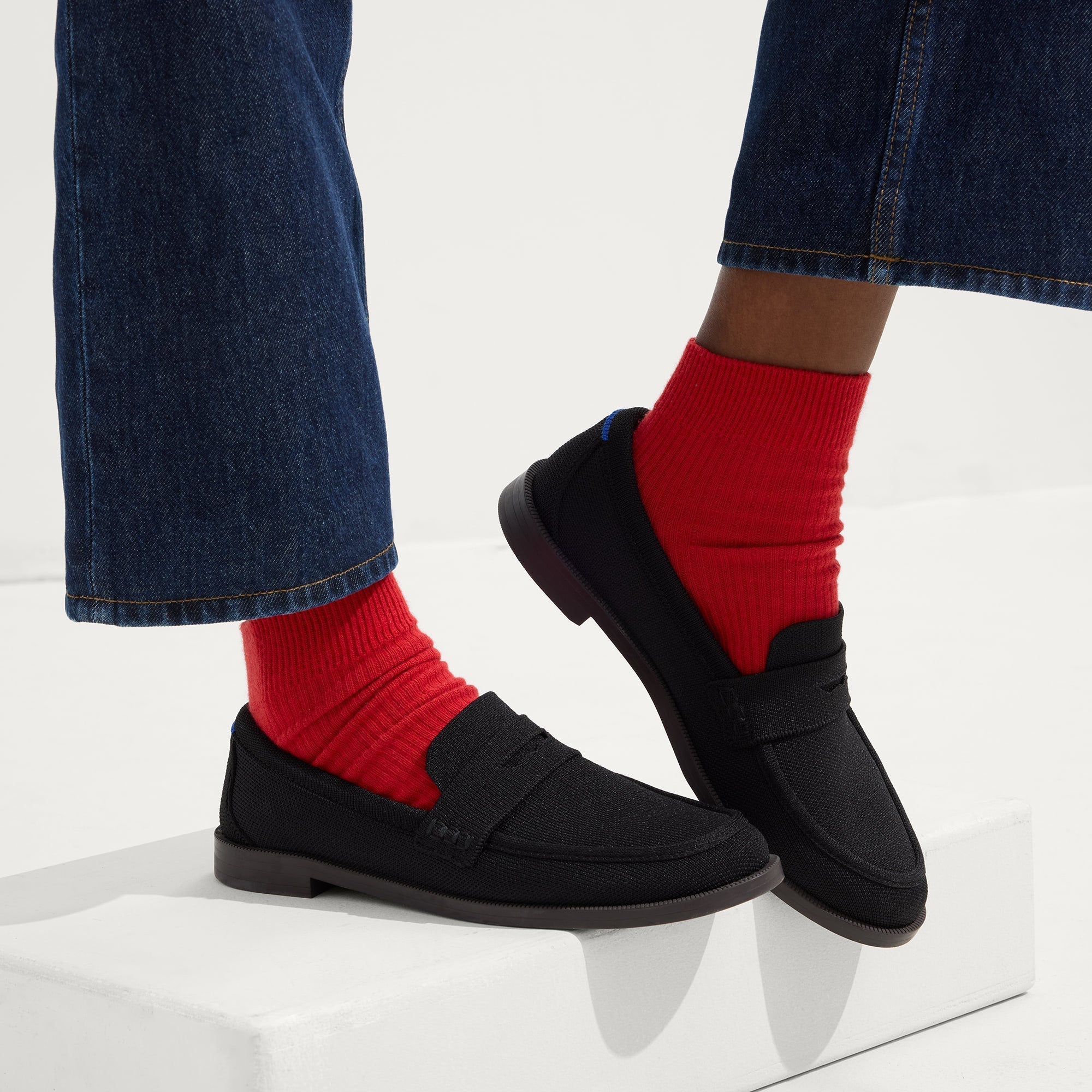hover | Model wearing The Penny Loafer in Black.