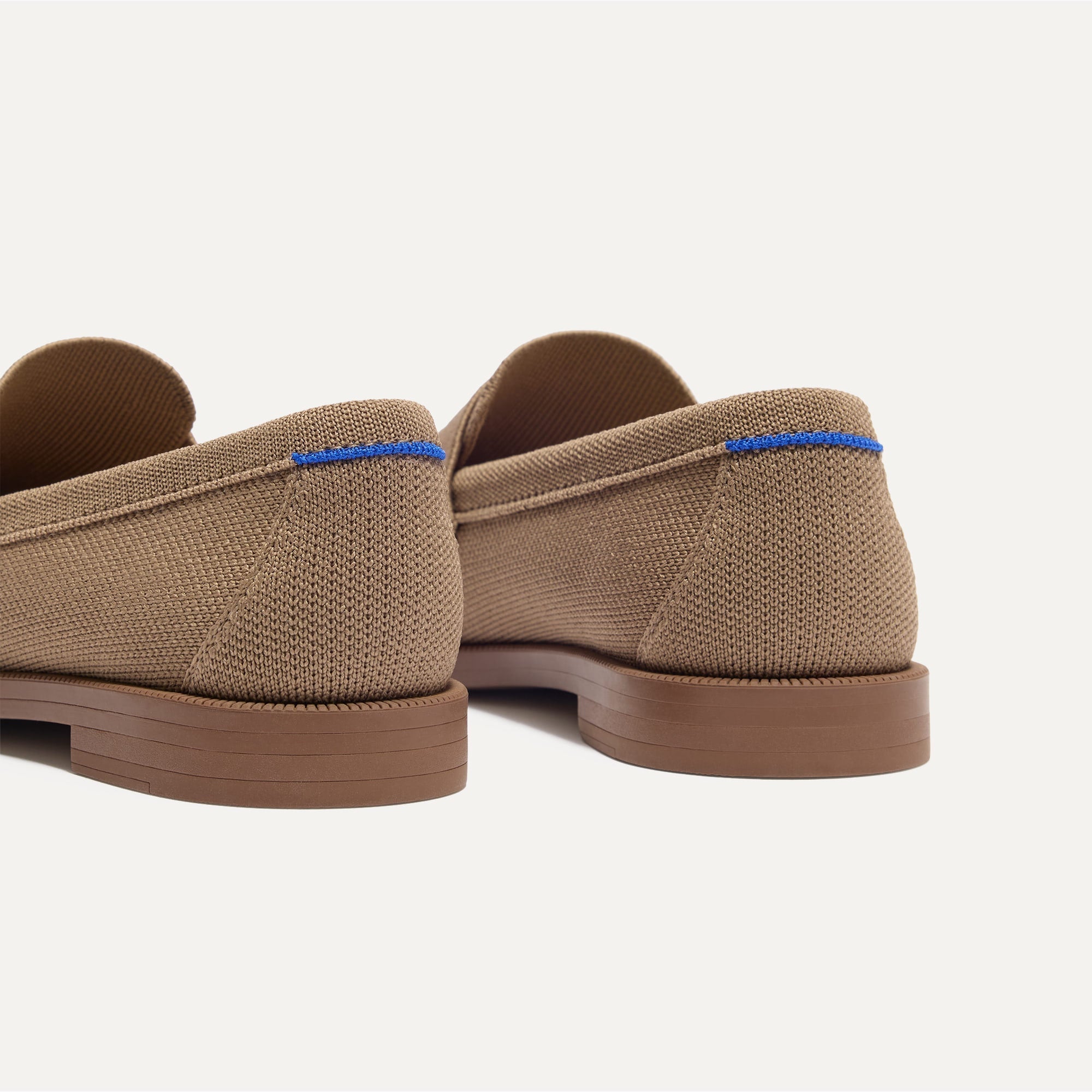 Close up of the heel of The Penny Loafer in Portobello, with Rothy's signature blue halo.  