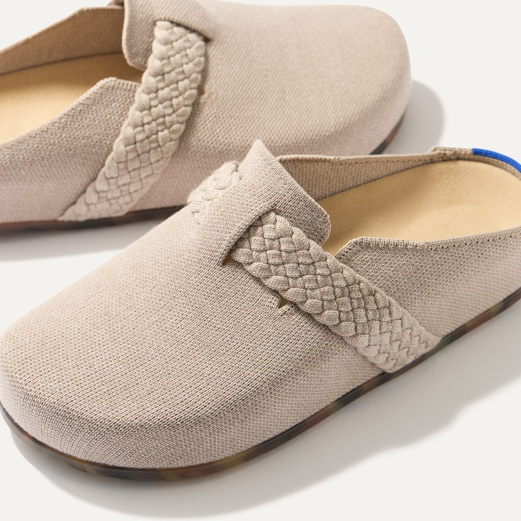 The toe and vamp of The Braid Clog, in diagonal view.