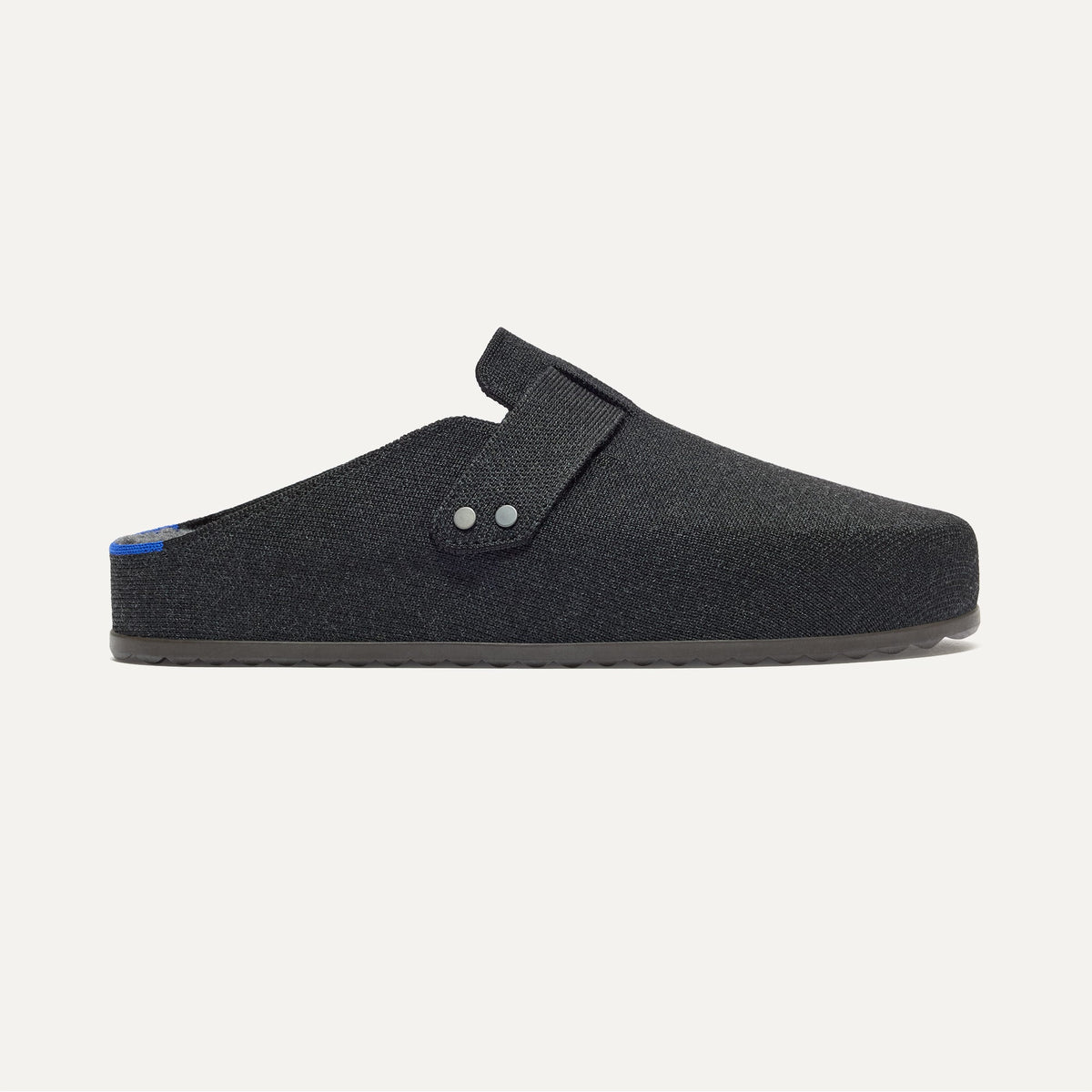 The Men's Cozy Clog in Black shown from the side. 