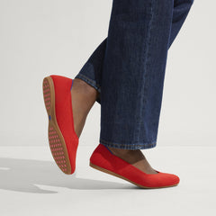 hover | Model wearing The Daily Flat in Showstopper Red. 